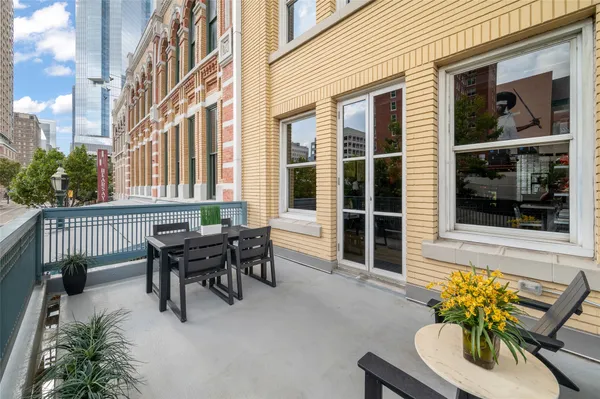 a view of a house with a lounge chair