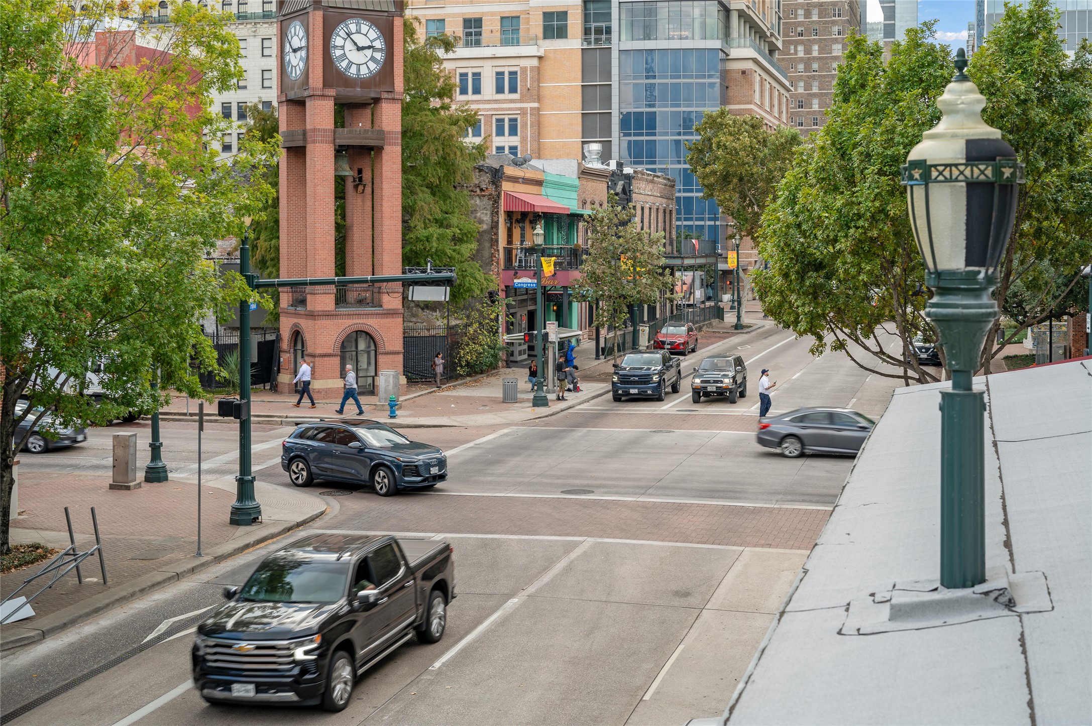 204 Travis Street, Unit 2C Houston, TX 77002 - Photo 21 of 28 a car parked in front of a building