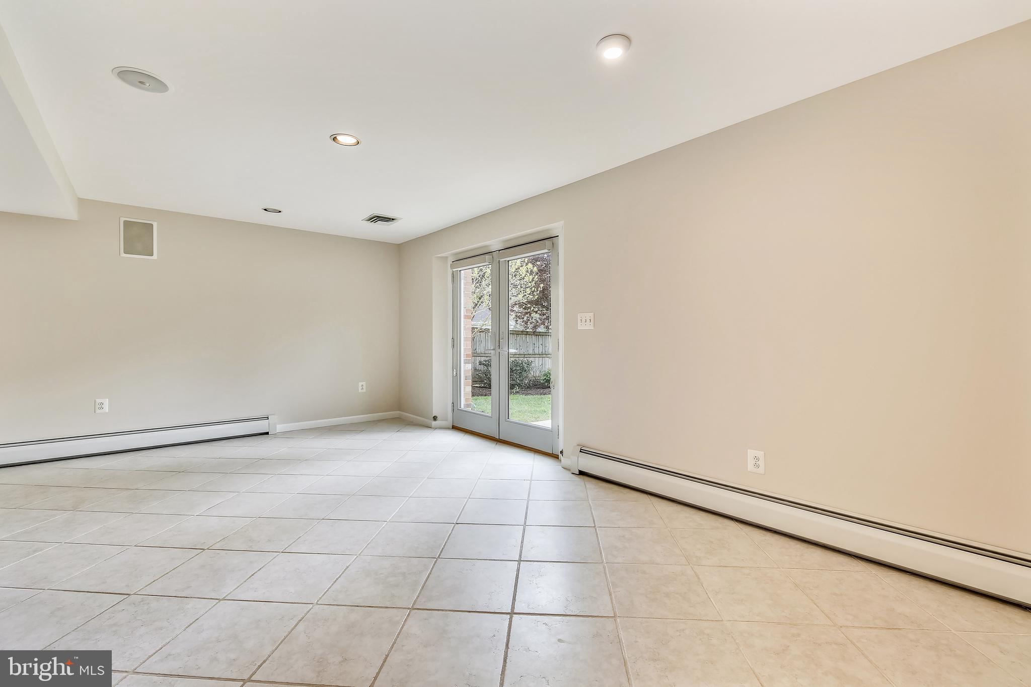 1329 Winding Waye Lane Silver Spring, MD 20902 - Photo 29 of 39 Lower Level Rec Room Walk-out