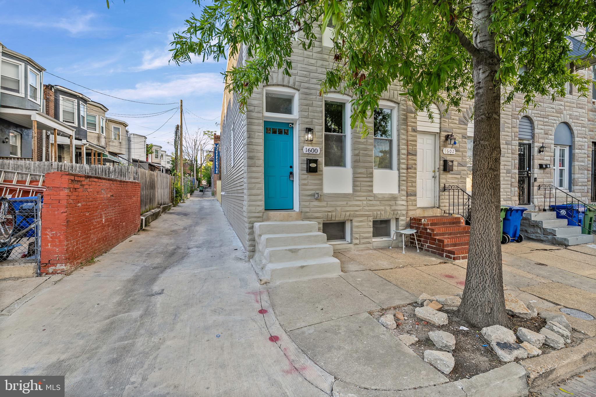 1600 Federal Street Baltimore, MD 21213 - Photo 2 of 31 a view of a building with a patio
