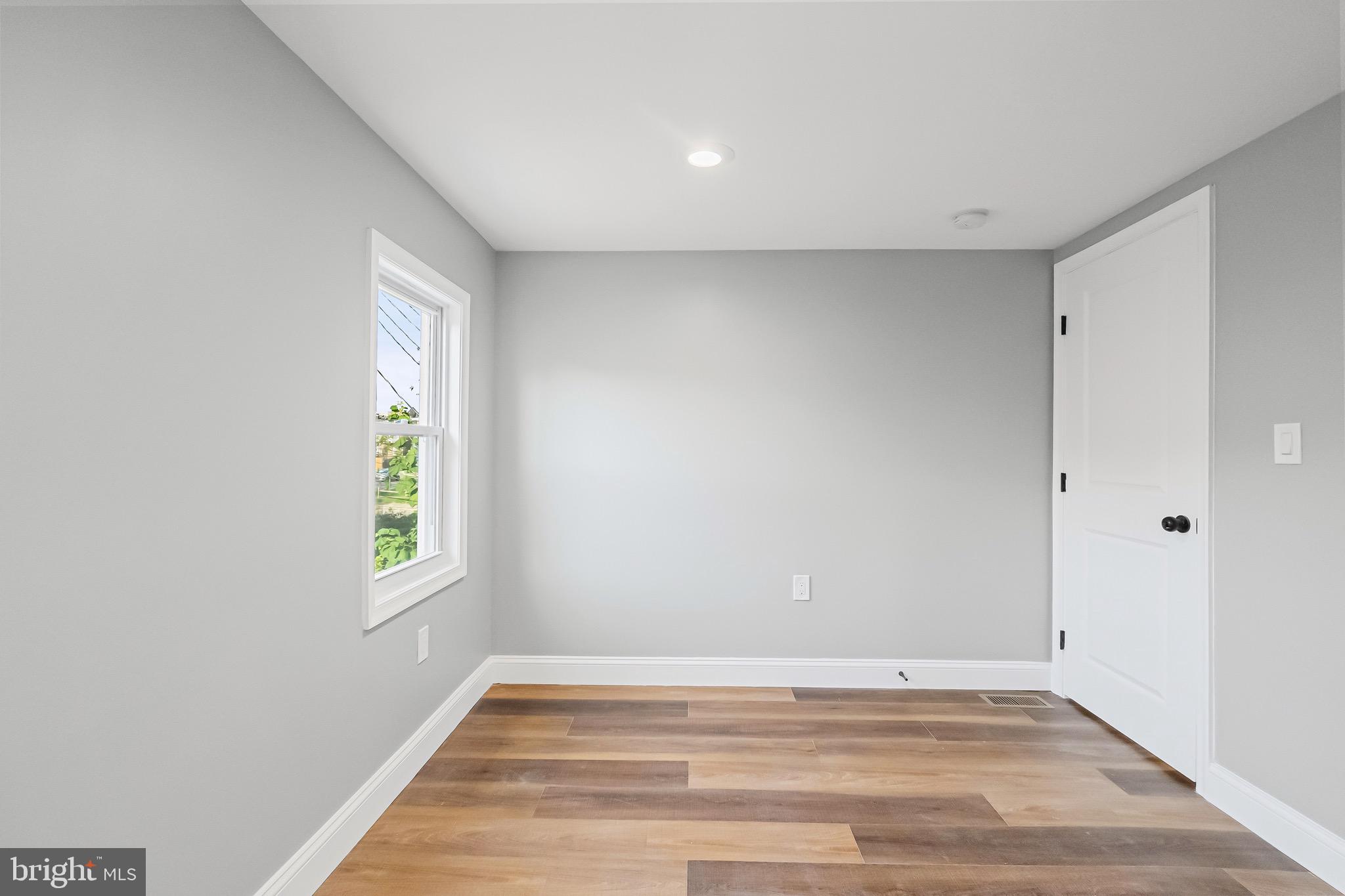 1600 Federal Street Baltimore, MD 21213 - Photo 22 of 31 a view of an empty room with a window