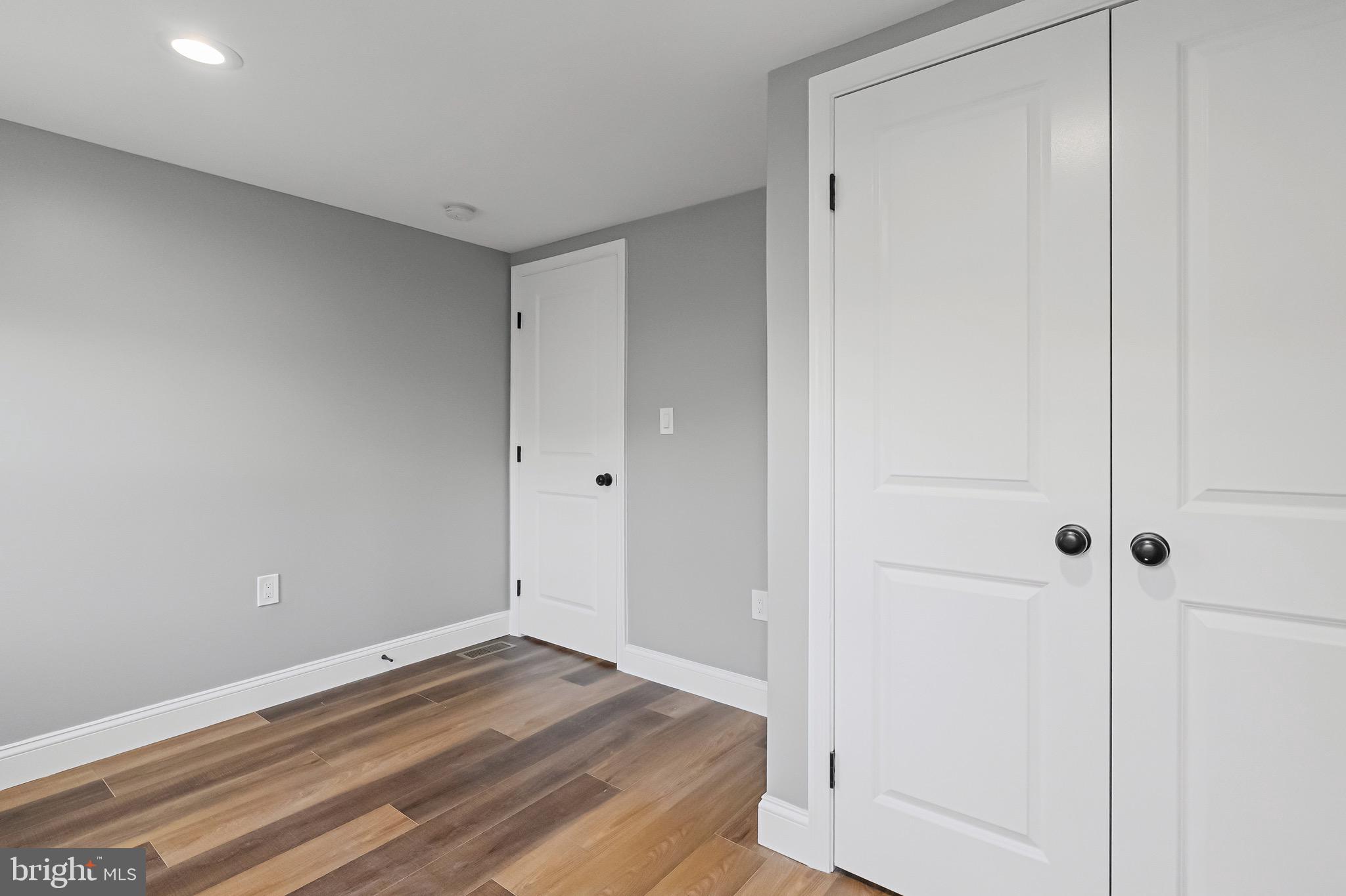 1600 Federal Street Baltimore, MD 21213 - Photo 23 of 31 a view of a room with wooden floor