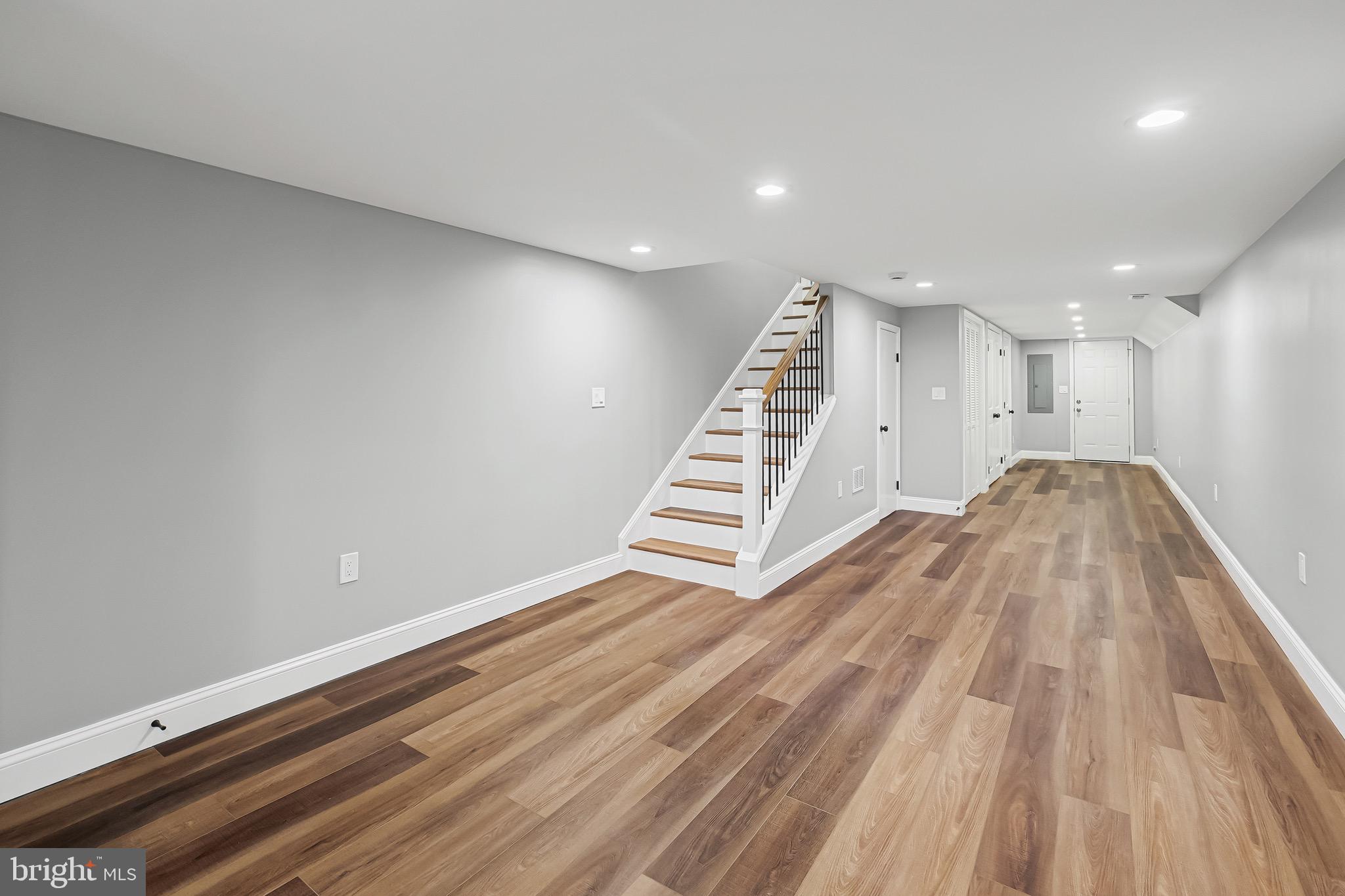 1600 Federal Street Baltimore, MD 21213 - Photo 24 of 31 a view of a room with wooden floor and stairs