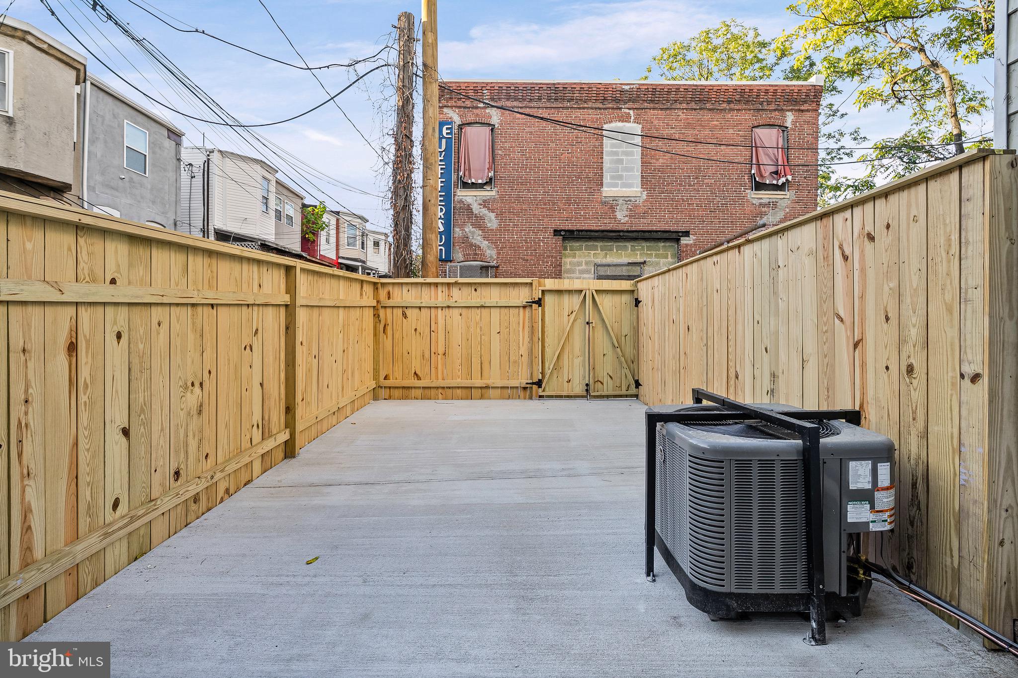 1600 Federal Street Baltimore, MD 21213 - Photo 27 of 31 a view of a building with wooden fence