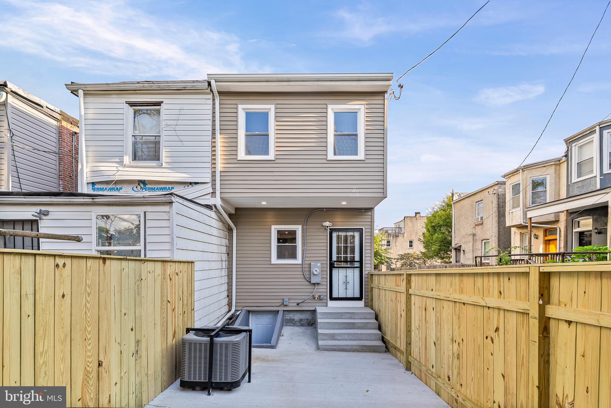 1600 Federal Street Baltimore, MD 21213 - Photo 28 of 31 a view of a house with wooden fence