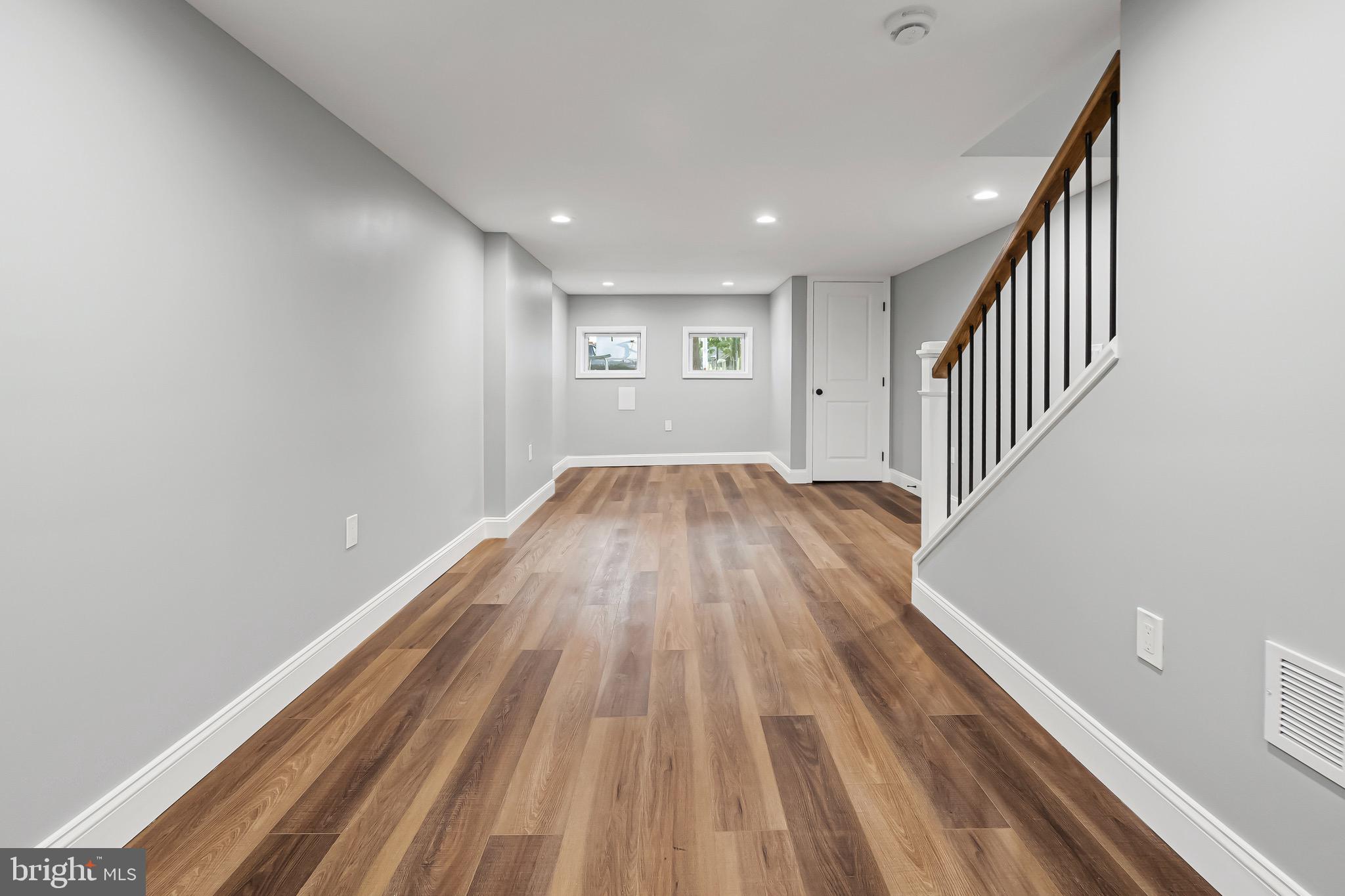 1600 Federal Street Baltimore, MD 21213 - Photo 31 of 31 a view of a room with wooden floor and staircase