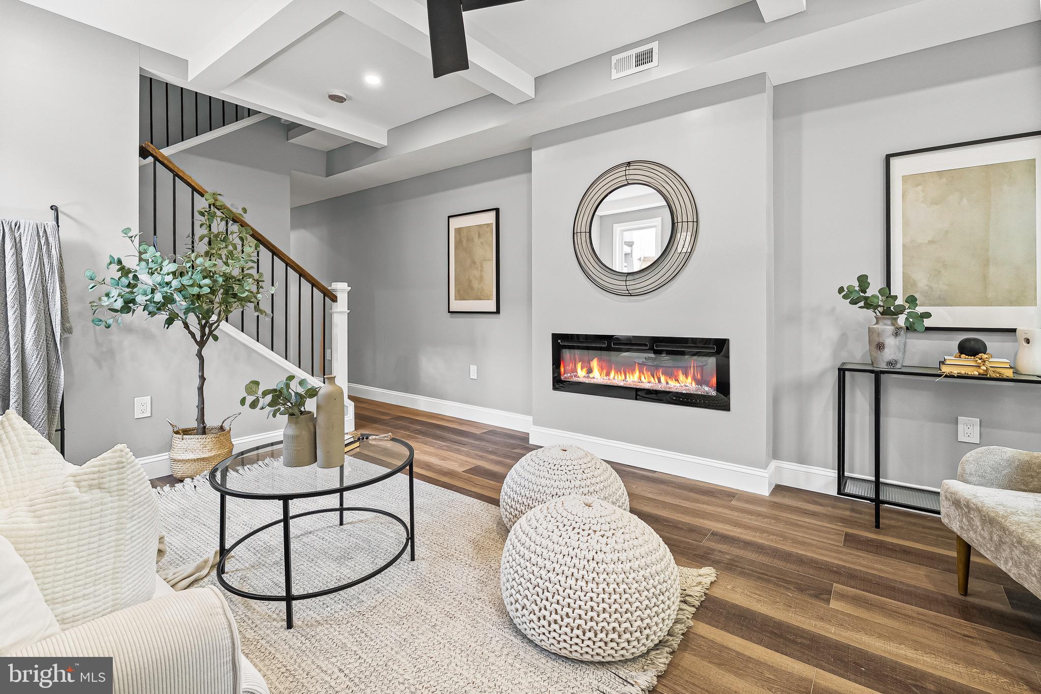 1600 Federal Street Baltimore, MD 21213 - Photo 4 of 31 a living room with furniture and a clock