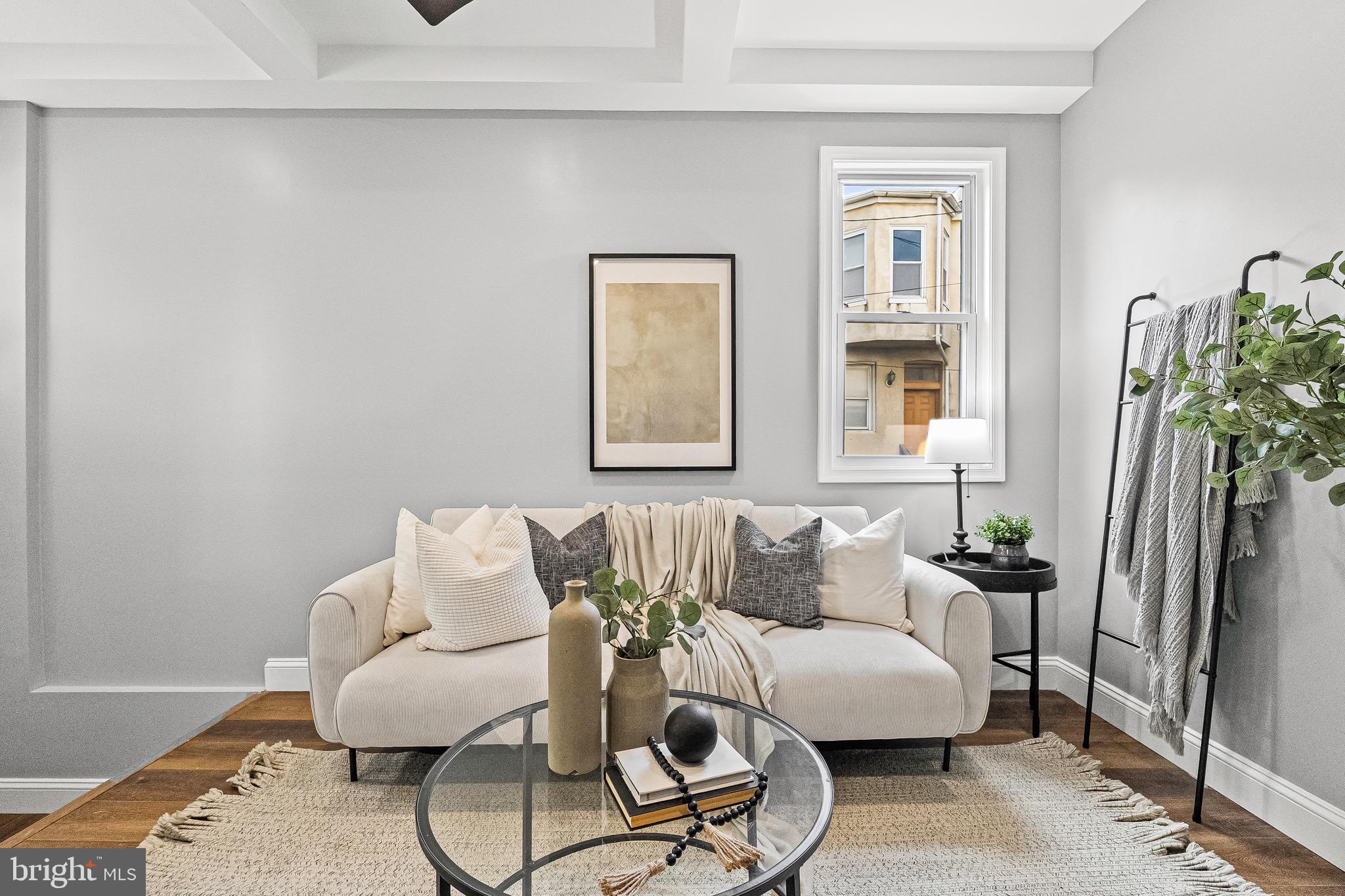 1600 Federal Street Baltimore, MD 21213 - Photo 6 of 31 a living room with furniture and a potted plant