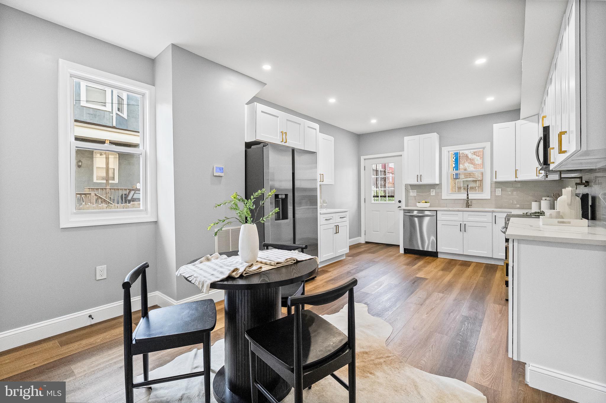 1600 Federal Street Baltimore, MD 21213 - Photo 9 of 31 a view of a dining room with furniture and wooden floor
