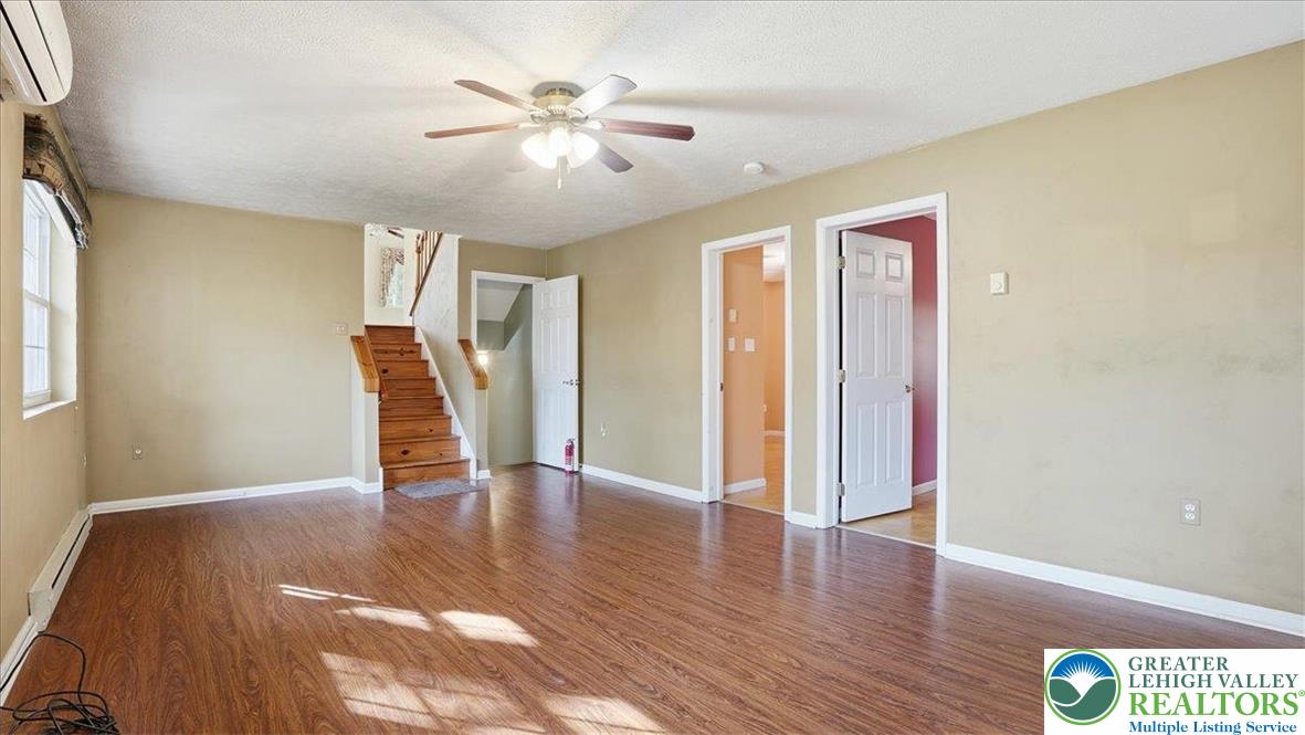 349 Bumble Bee Pass Cresco, PA 18326 - Photo 19 of 92 a view of an empty room with wooden floor and a window