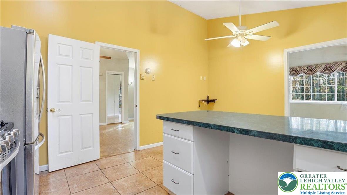 349 Bumble Bee Pass Cresco, PA 18326 - Photo 26 of 92 a en suite bathroom with a granite countertop sink and a mirror