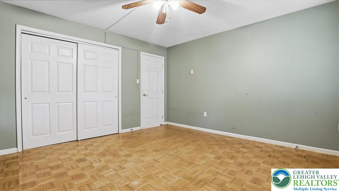 349 Bumble Bee Pass Cresco, PA 18326 - Photo 39 of 92 an empty room with a ceiling fan