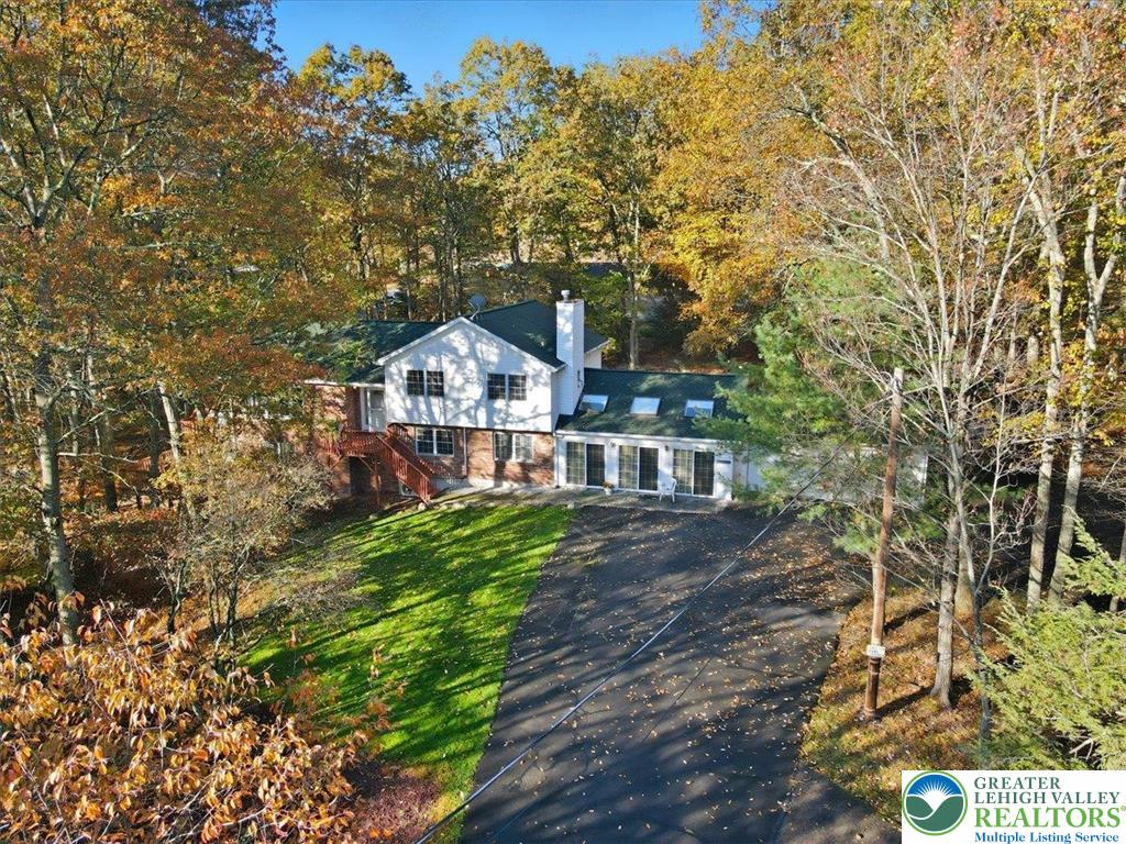 349 Bumble Bee Pass Cresco, PA 18326 - Photo 4 of 92 a house in middle of the green field