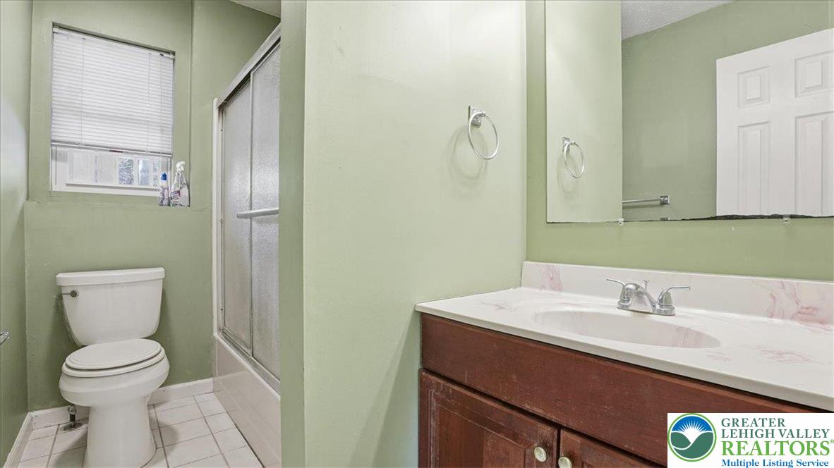 349 Bumble Bee Pass Cresco, PA 18326 - Photo 41 of 92 a bathroom with a sink toilet and a mirror