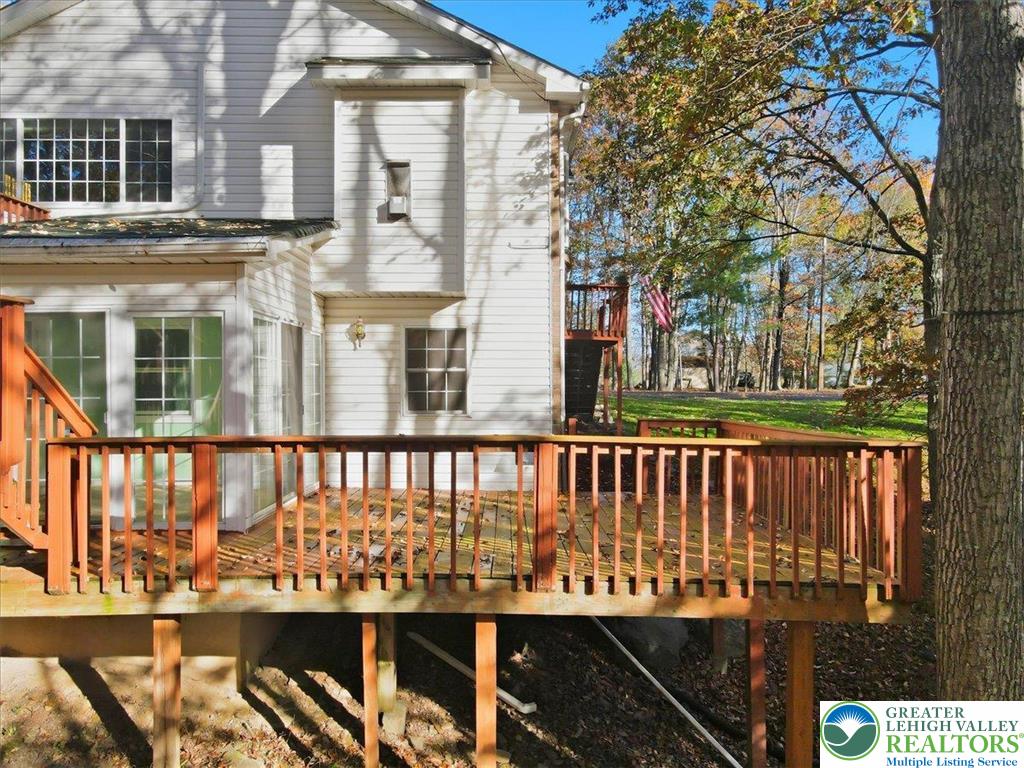349 Bumble Bee Pass Cresco, PA 18326 - Photo 73 of 92 a view of a brick house with large windows
