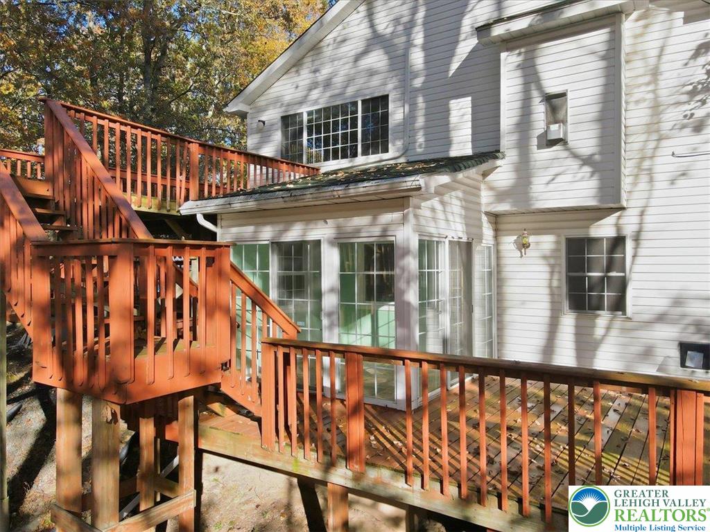 349 Bumble Bee Pass Cresco, PA 18326 - Photo 74 of 92 a view of balcony with wooden floor and fence