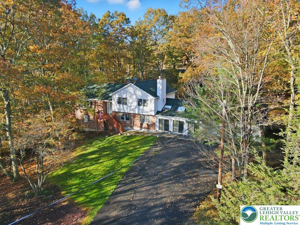 349 Bumble Bee Pass Cresco, PA 18326 - Photo 81 of 92 a view of a house with a yard