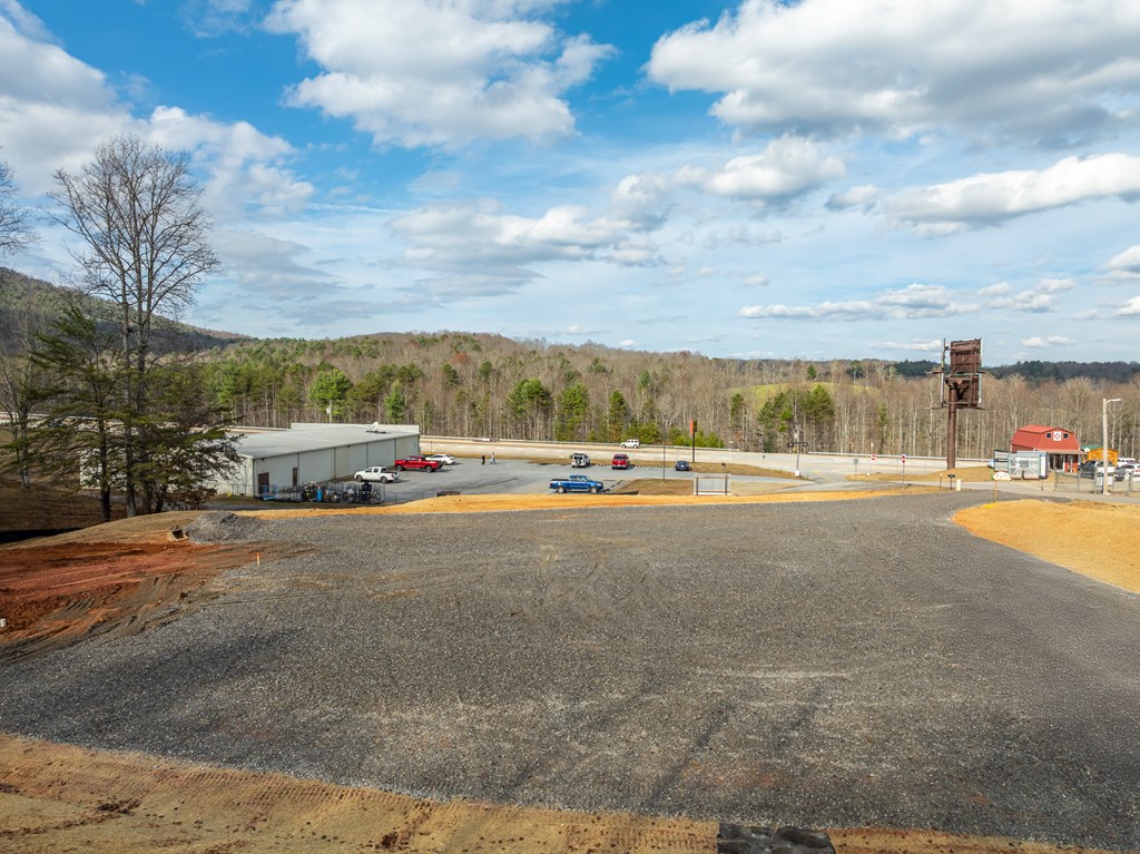 Lot 1 Copperhead Road Blairsville, GA 30512 - Photo 4 of 18 a view of building with swimming pool and mountains in the background