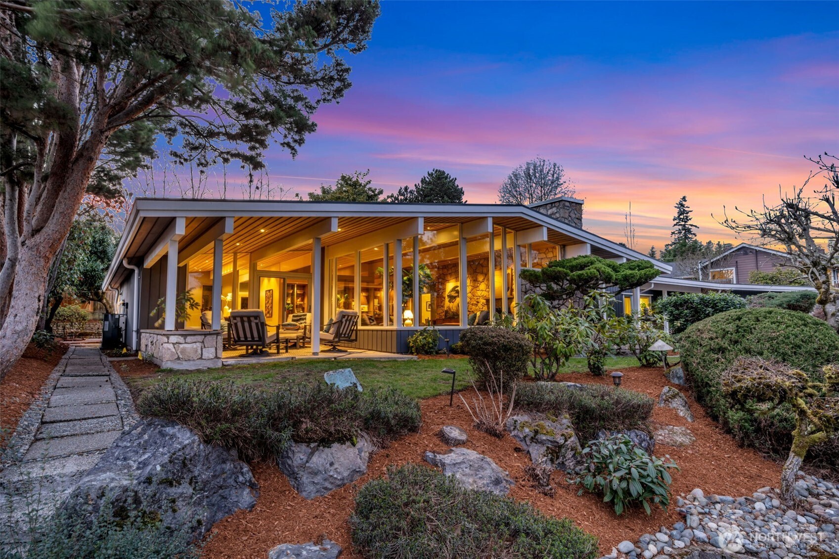 6437 Hampton Road South Seattle, WA 98118 - Photo 1 of 39 a view of a big house with a big yard and potted plants