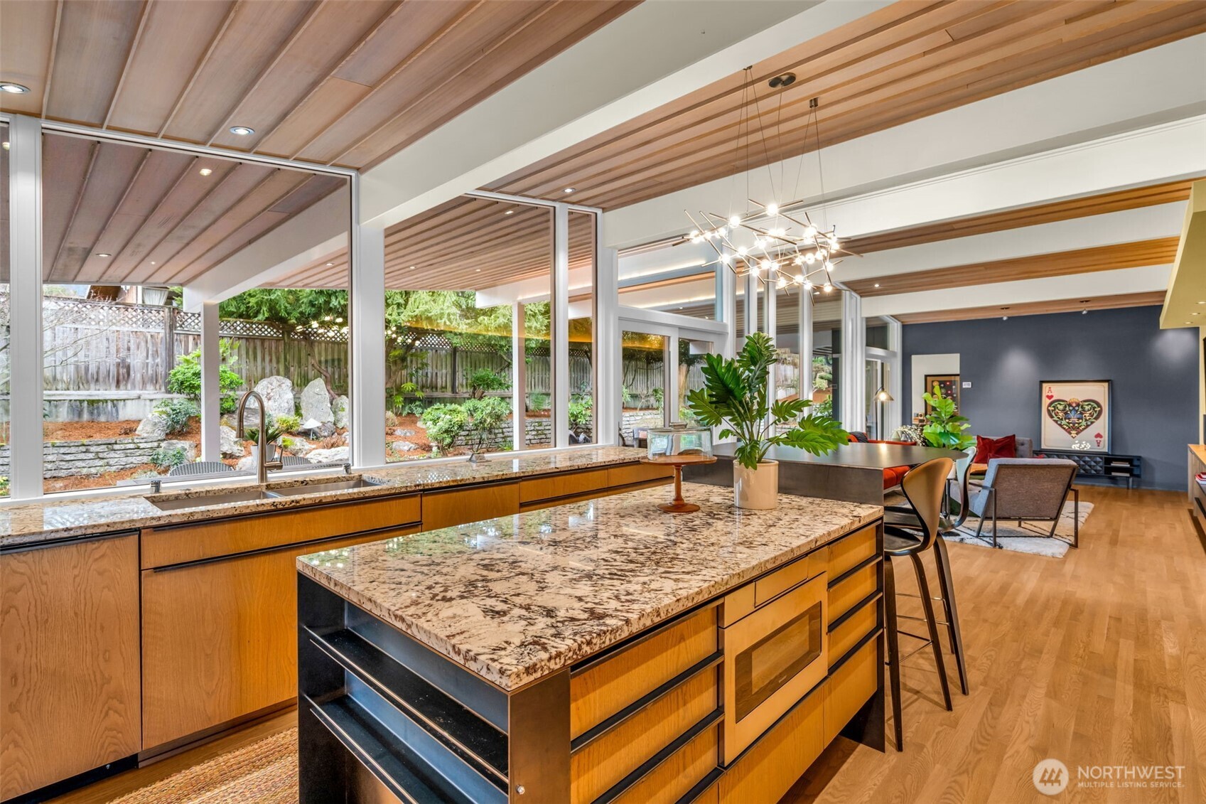 6437 Hampton Road South Seattle, WA 98118 - Photo 14 of 39 a view of a living room and kitchen