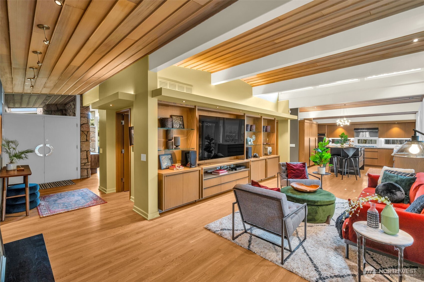 6437 Hampton Road South Seattle, WA 98118 - Photo 18 of 39 a living room with furniture and a flat screen tv
