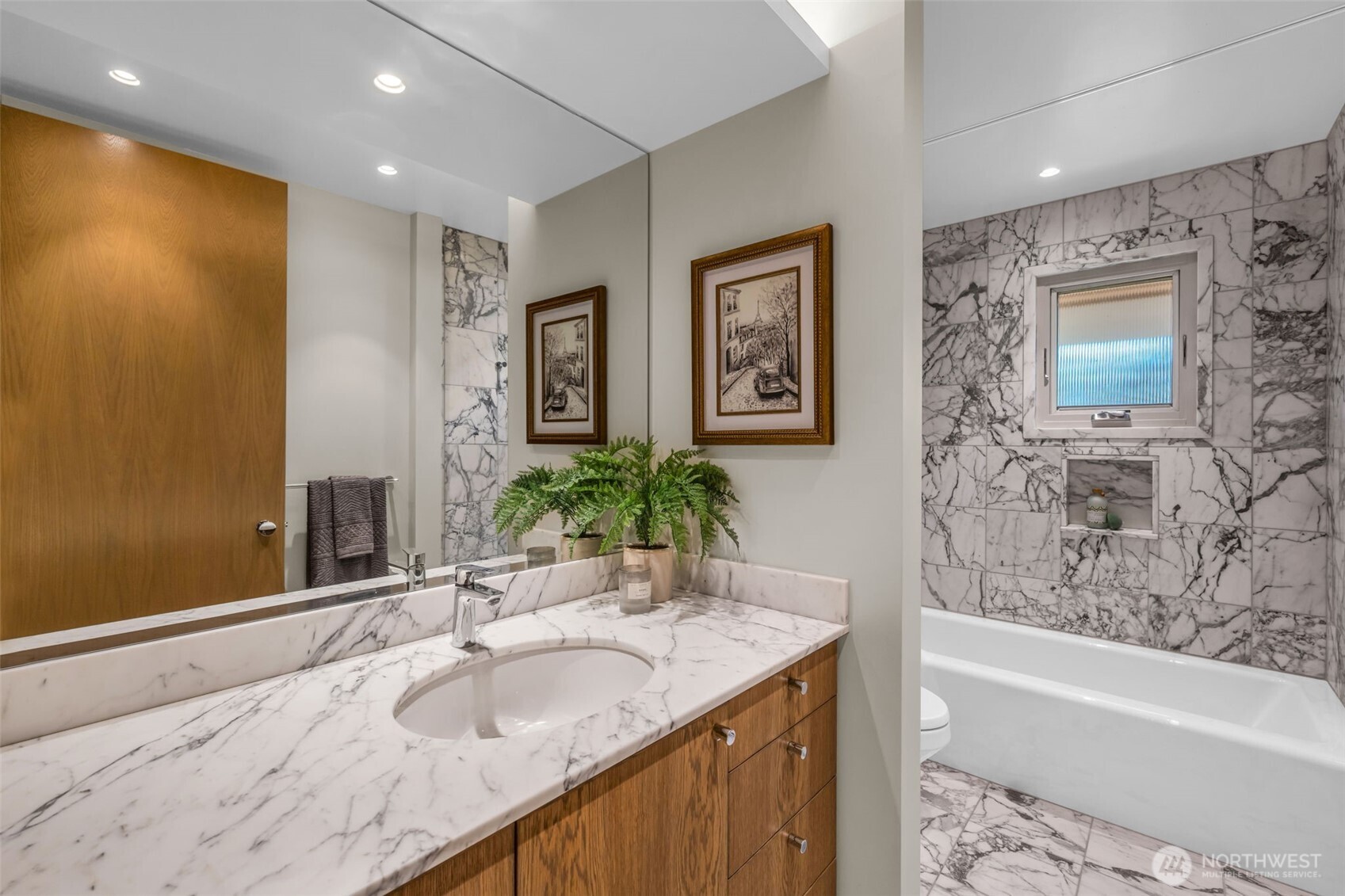 6437 Hampton Road South Seattle, WA 98118 - Photo 22 of 39 a bathroom with a granite countertop sink and a bathtub