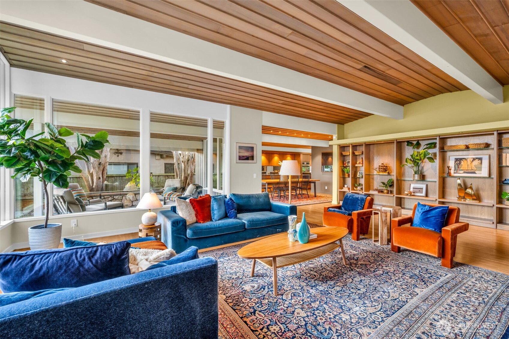 6437 Hampton Road South Seattle, WA 98118 - Photo 7 of 39 a living room with furniture a rug and a large window