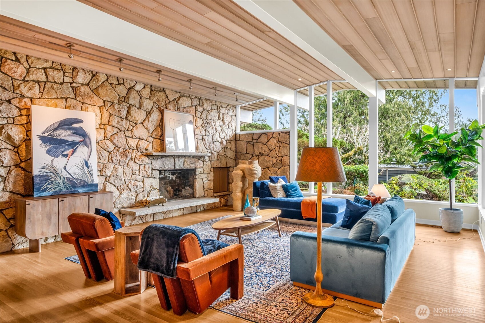 6437 Hampton Road South Seattle, WA 98118 - Photo 8 of 39 a living room with fireplace furniture and a large window