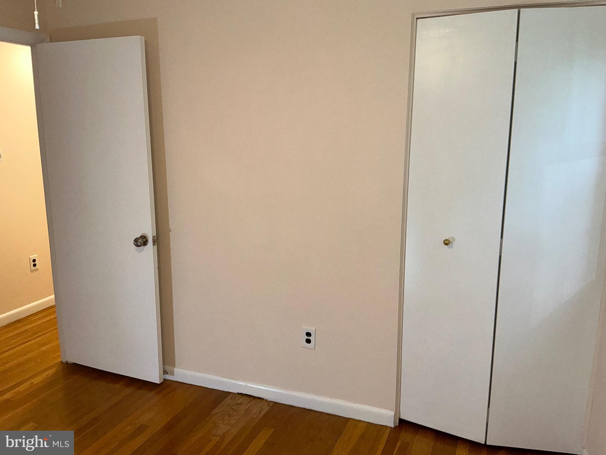 303 Charlton Court Silver Spring, MD 20902 - Photo 23 of 45 a view of a room with wooden floor