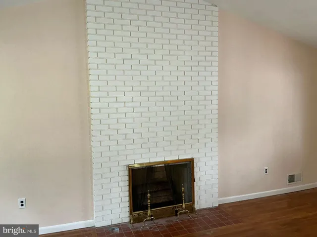 a room with a fireplace