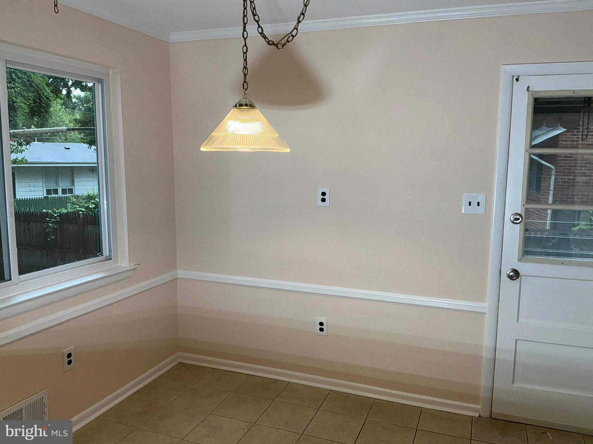 303 Charlton Court Silver Spring, MD 20902 - Photo 4 of 45 a view of a bathroom with a window