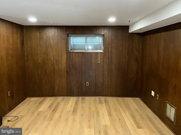 a view of a livingroom with a wooden door