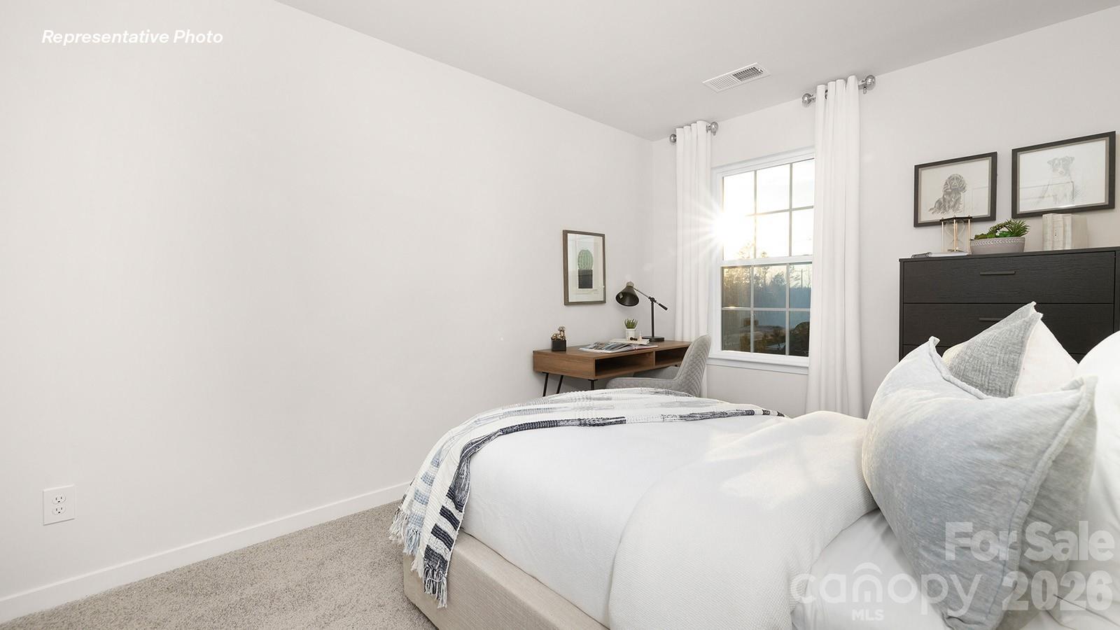 1029 Horizon Lane Chester, SC 29706 - Photo 17 of 28 a bedroom with a bed and a large mirror