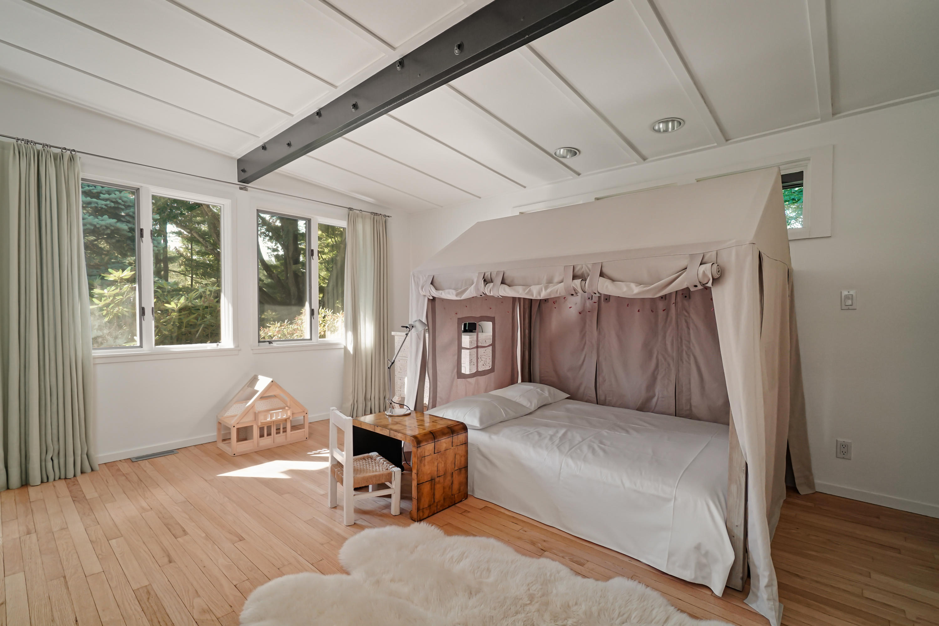 Undisclosed Address Wilton, CT 06897 - Photo 11 of 25 a bedroom with furniture and wooden floor