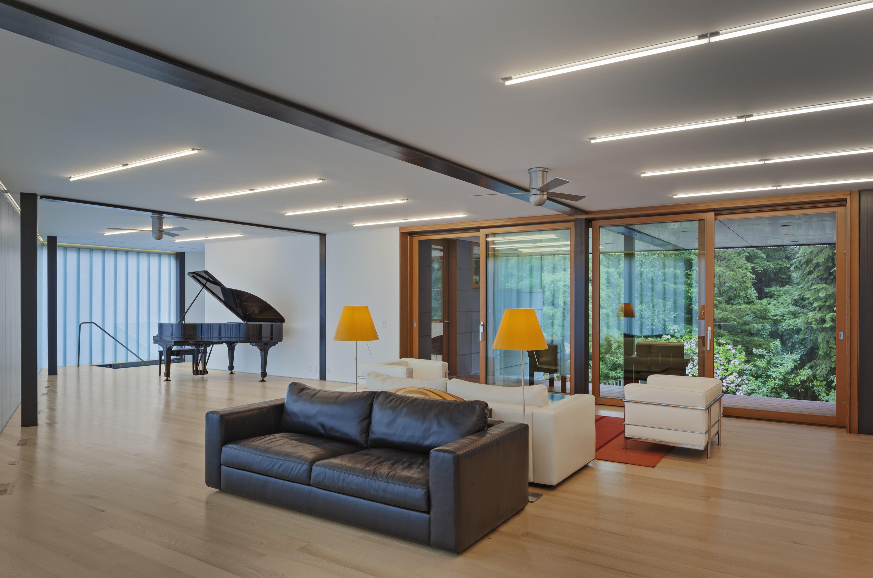 Undisclosed Address Wilton, CT 06897 - Photo 15 of 25 a living room with furniture and a potted plant