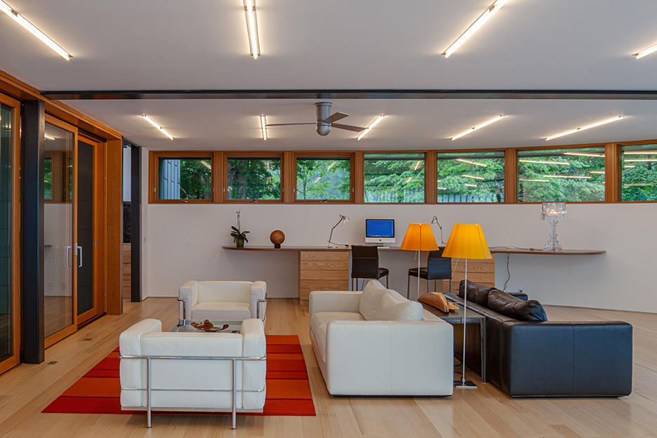 Undisclosed Address Wilton, CT 06897 - Photo 16 of 25 a living room with furniture and a flat screen tv