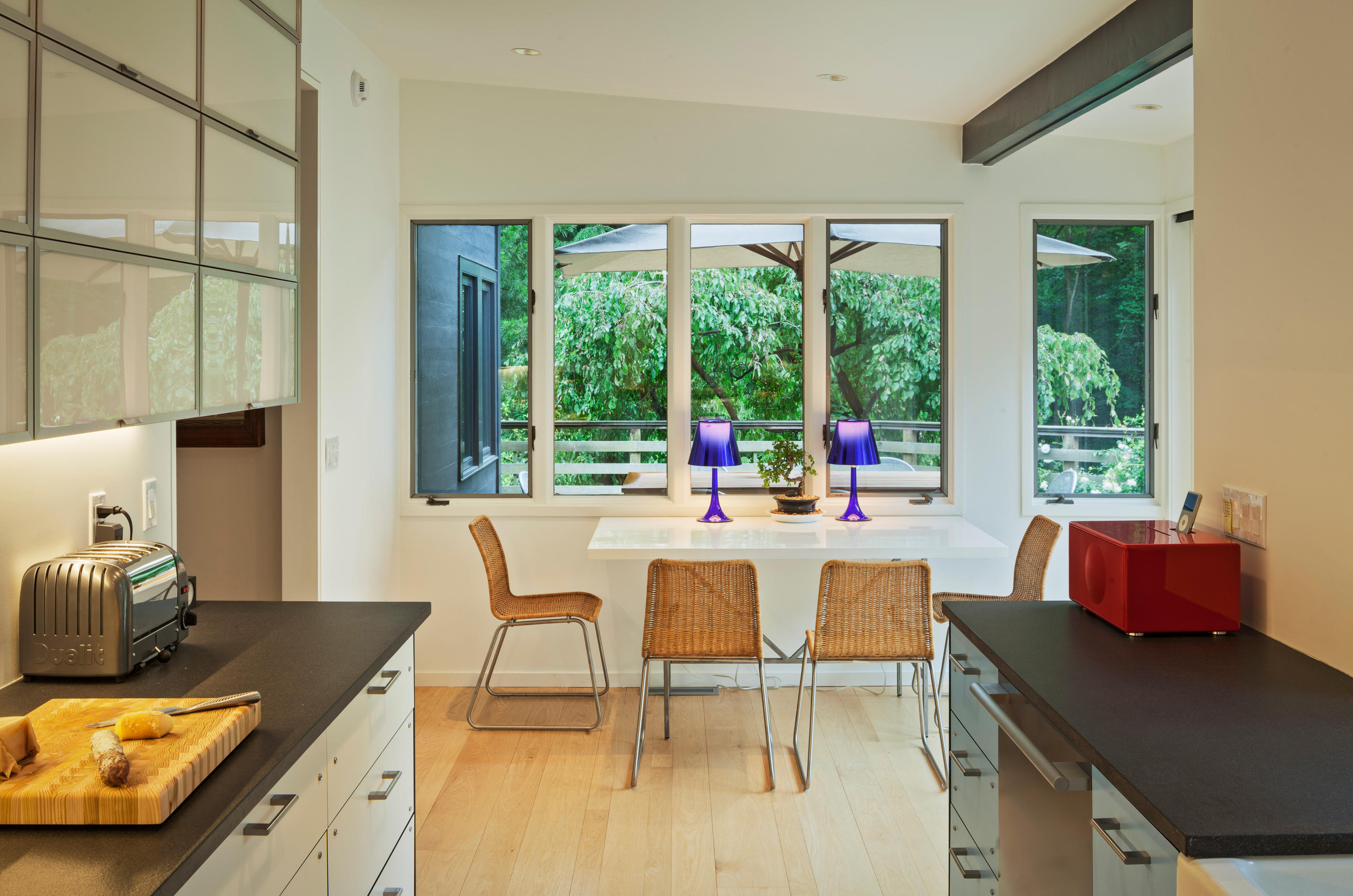 Undisclosed Address Wilton, CT 06897 - Photo 8 of 25 a dining room with a large window and table