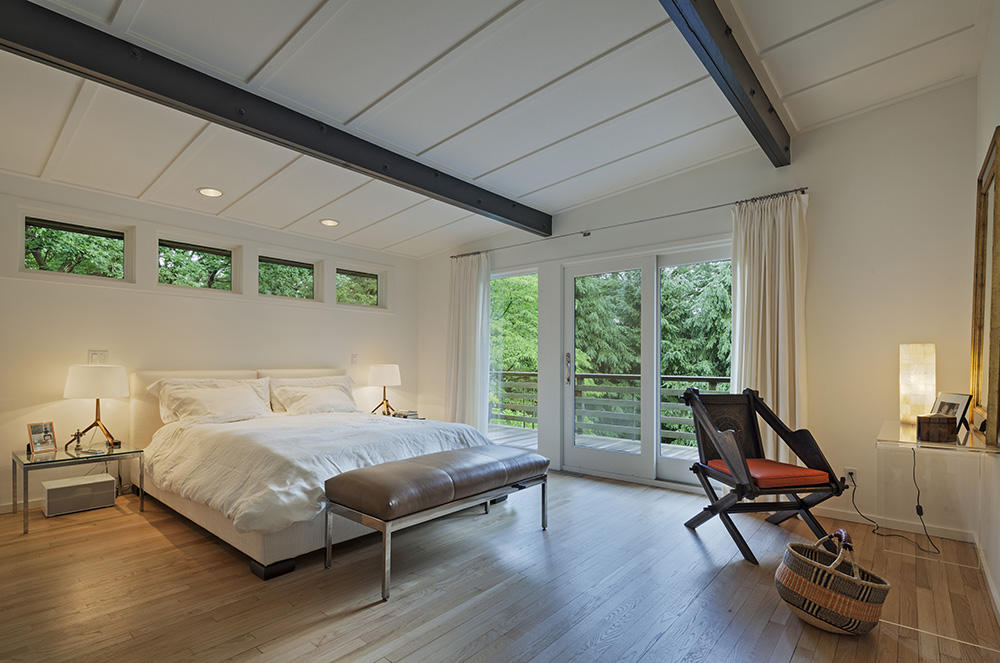 Undisclosed Address Wilton, CT 06897 - Photo 9 of 25 a bed room with a bed and a window