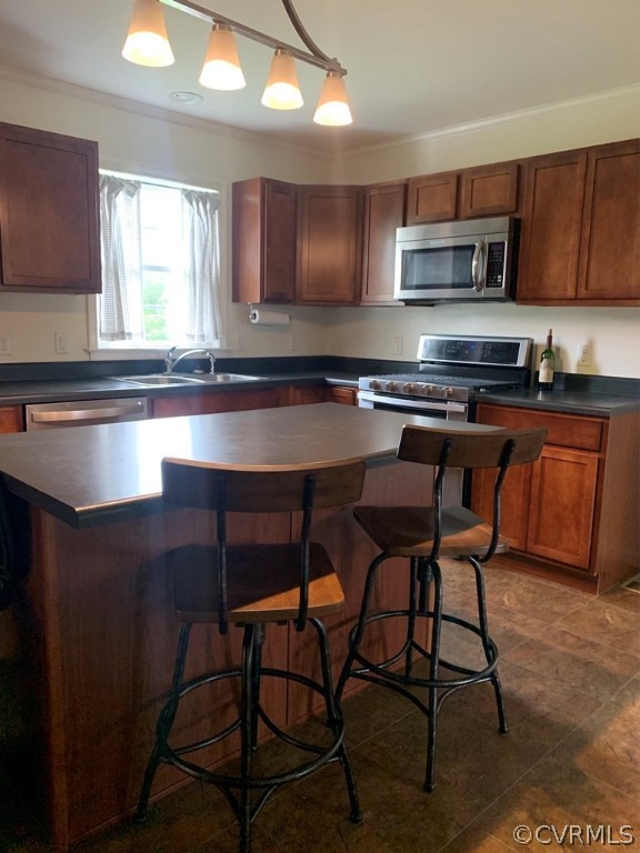 8117 Baltimore Road Ford, VA 23850 - Photo 5 of 26 a kitchen with stainless steel appliances granite countertop wooden cabinets a stove top oven a sink and dishwasher