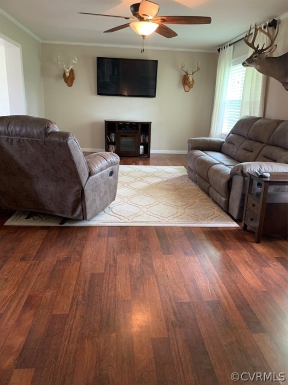 8117 Baltimore Road Ford, VA 23850 - Photo 8 of 26 a living room with furniture and a fireplace