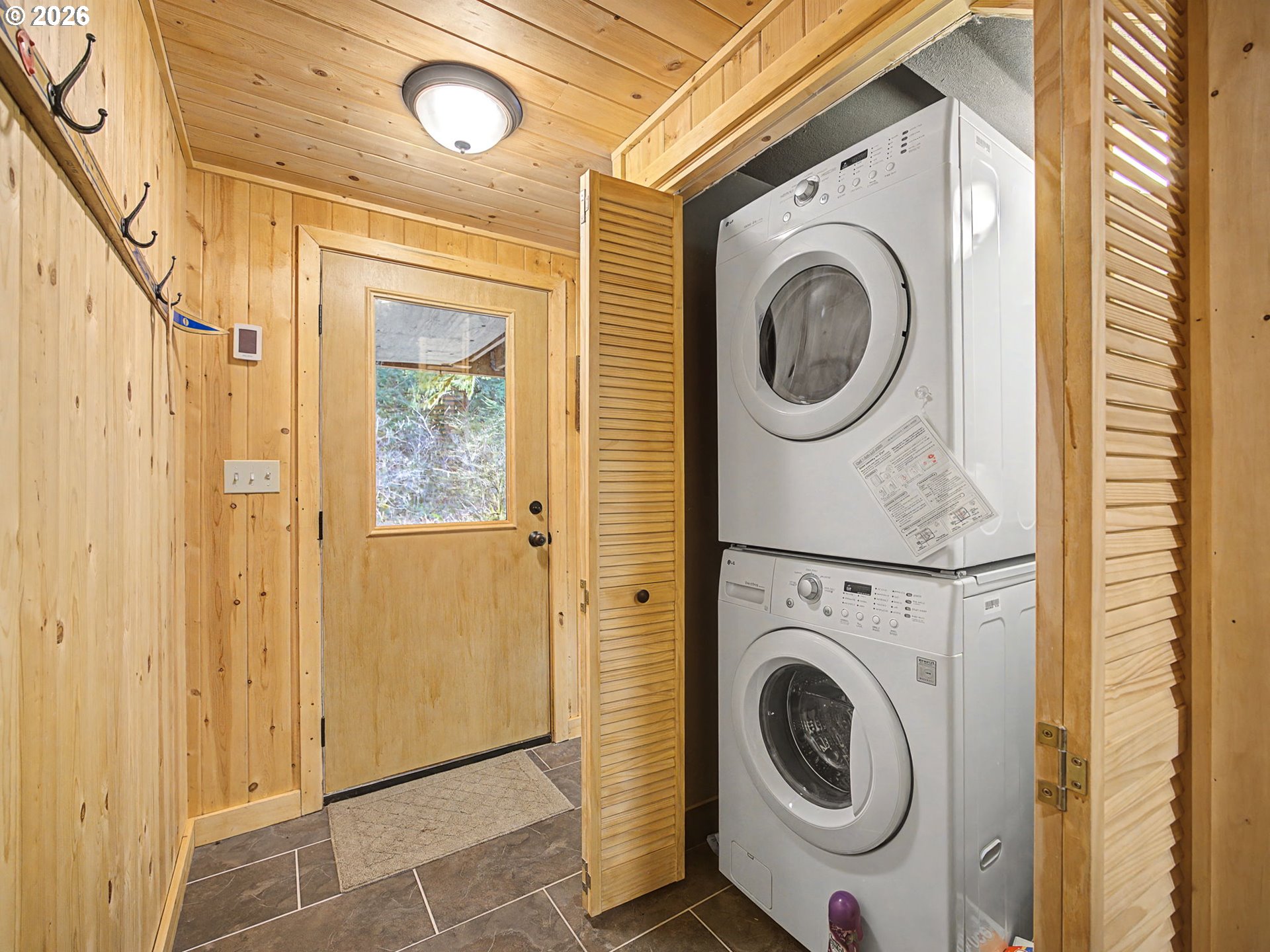 28910 Road 12 Rhododendron, OR 97049 - Photo 28 of 48 a utility room with dryer and washer