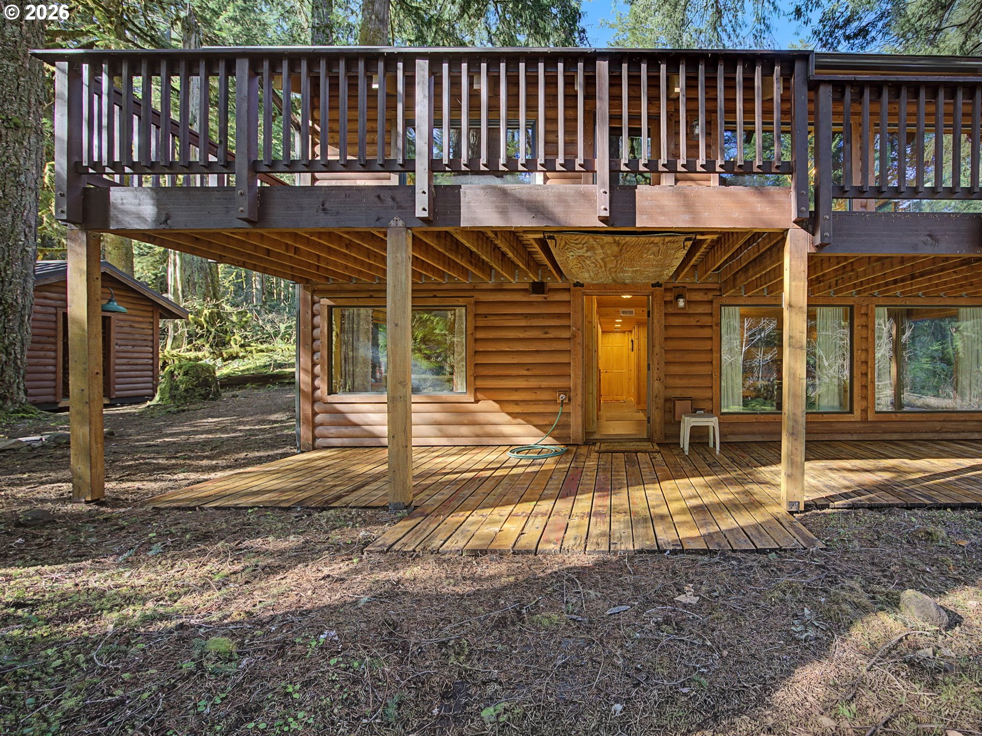 28910 Road 12 Rhododendron, OR 97049 - Photo 39 of 48 a view of a patio with a table chairs and wooden fence