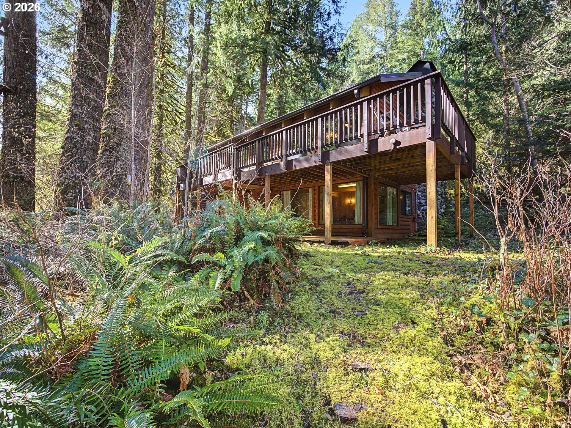 28910 Road 12 Rhododendron, OR 97049 - Photo 42 of 48 a view of a house with a small yard and plants