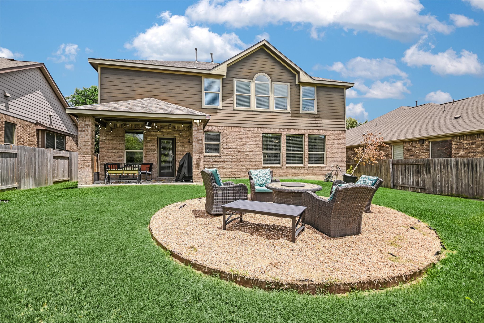 4623 Chestnut Meadows Bend Georgetown, TX 78626 - Photo 29 of 30 a view of a house with backyard sitting area and garden