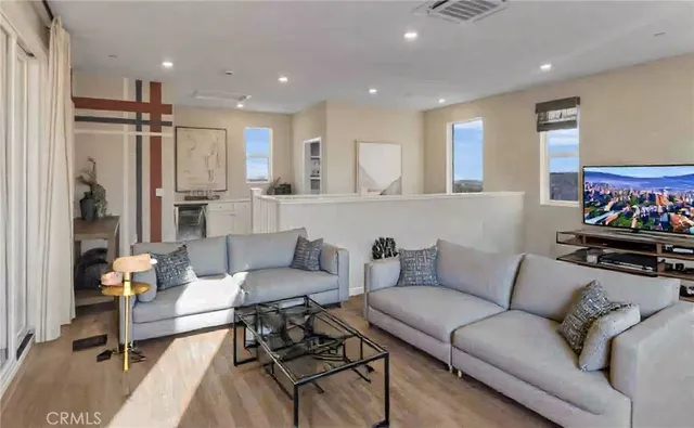 a living room with furniture and a couch