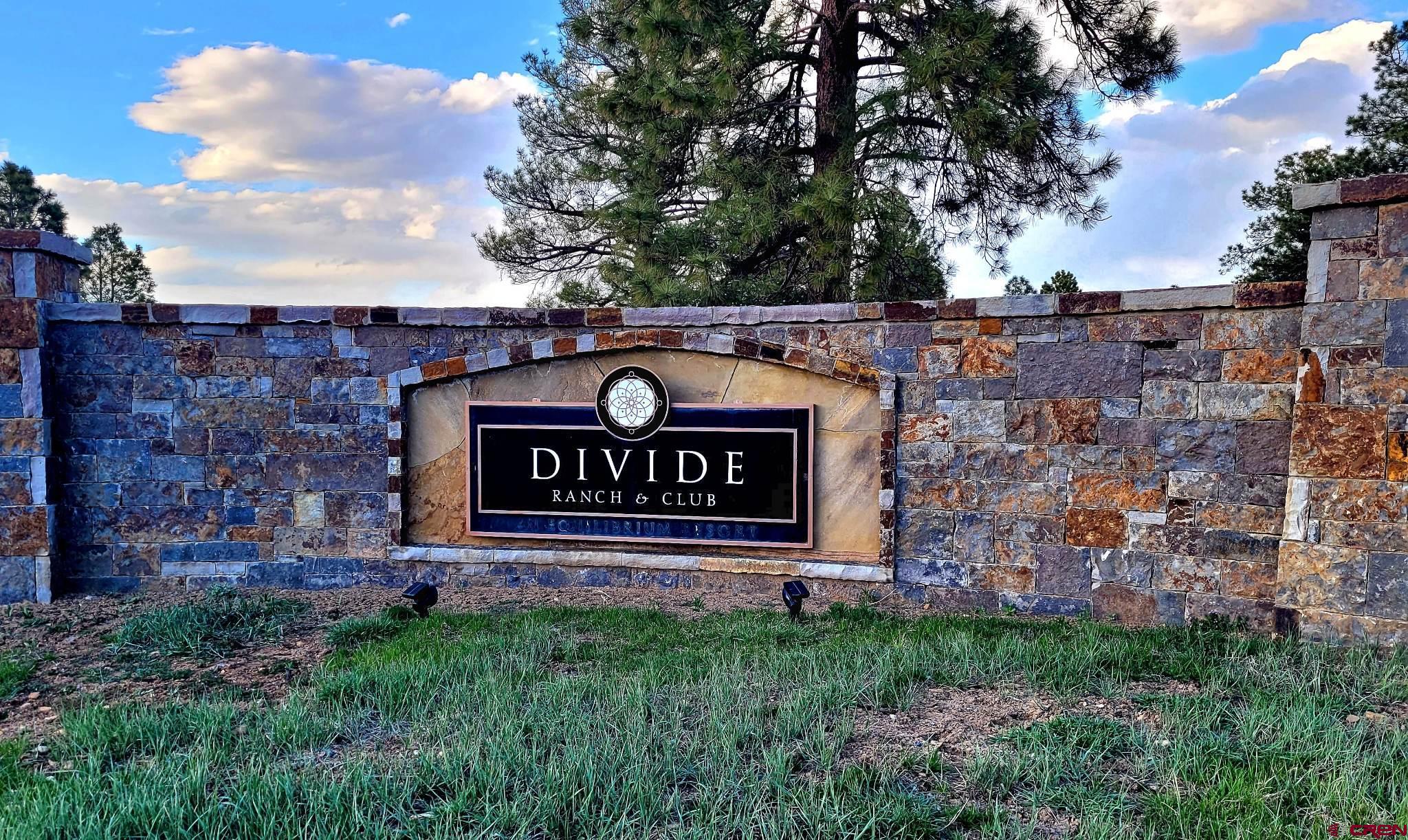 225 South Badger Trail Ridgway, CO 81432 - Photo 6 of 8 a sign on the side of a building