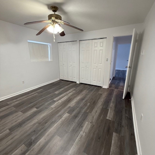 29 Gordon Street, Unit 107 Framingham, MA 01702 - Photo 11 of 17 wooden floor in an empty room with a window