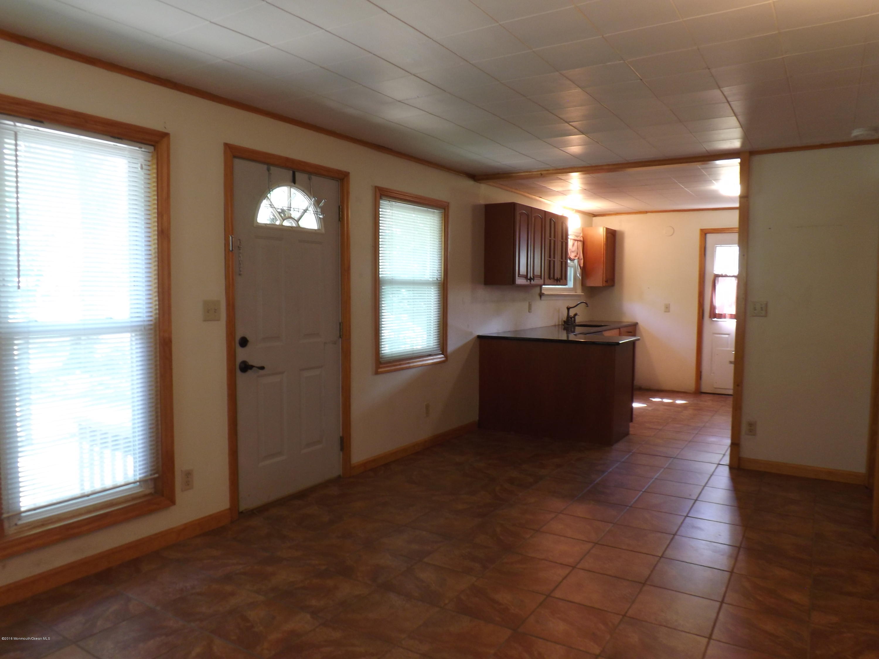 73 Lemon Road Howell, NJ 07731 - Photo 3 of 17 a view of a kitchen with a sink and a window
