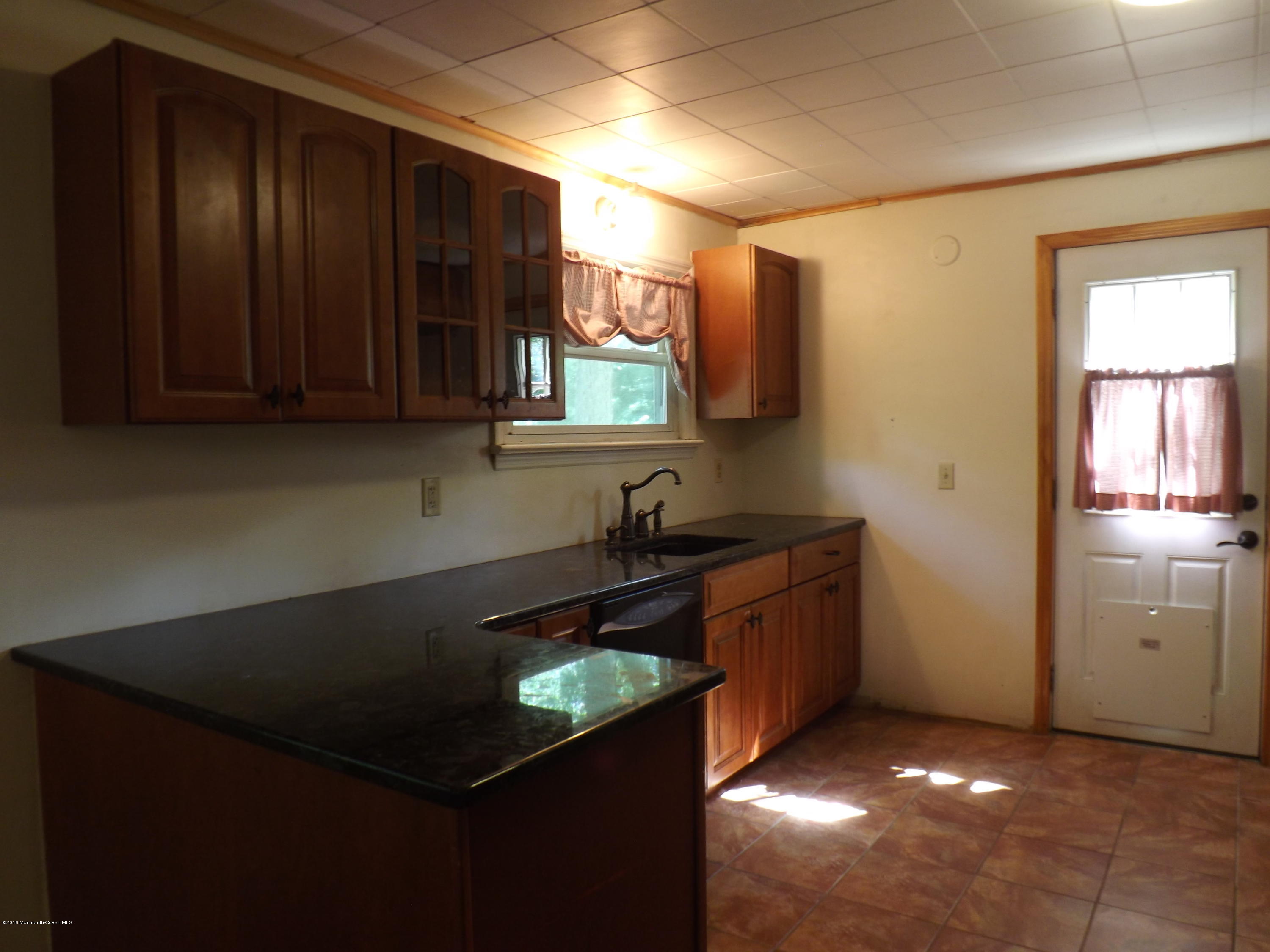 73 Lemon Road Howell, NJ 07731 - Photo 5 of 17 a kitchen with a sink and cabinets