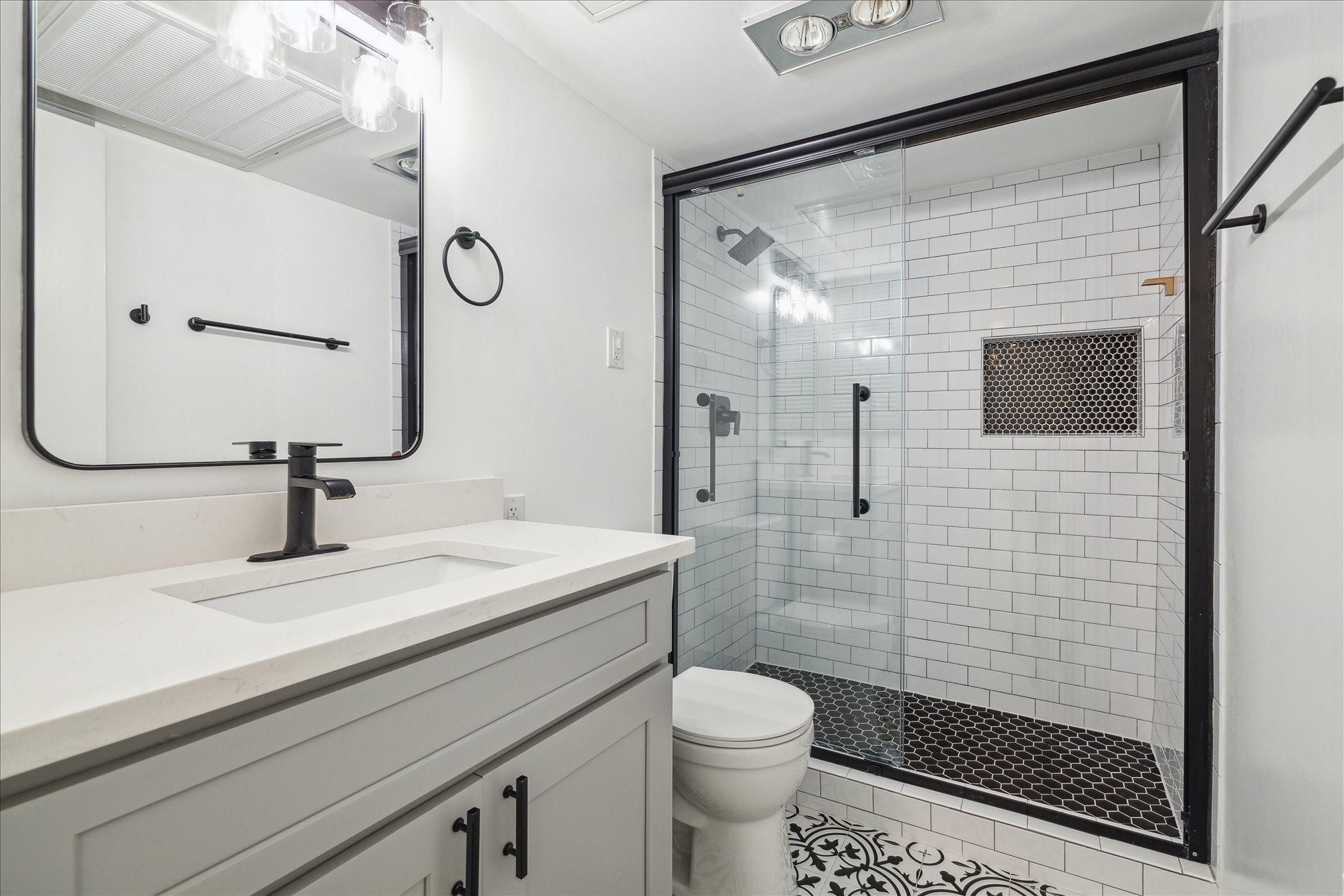 7821 Rue St Cyr Street, Unit 55 Houston, TX 77074 - Photo 11 of 16 Fully remodeled bathroom with oversized walk-in shower.